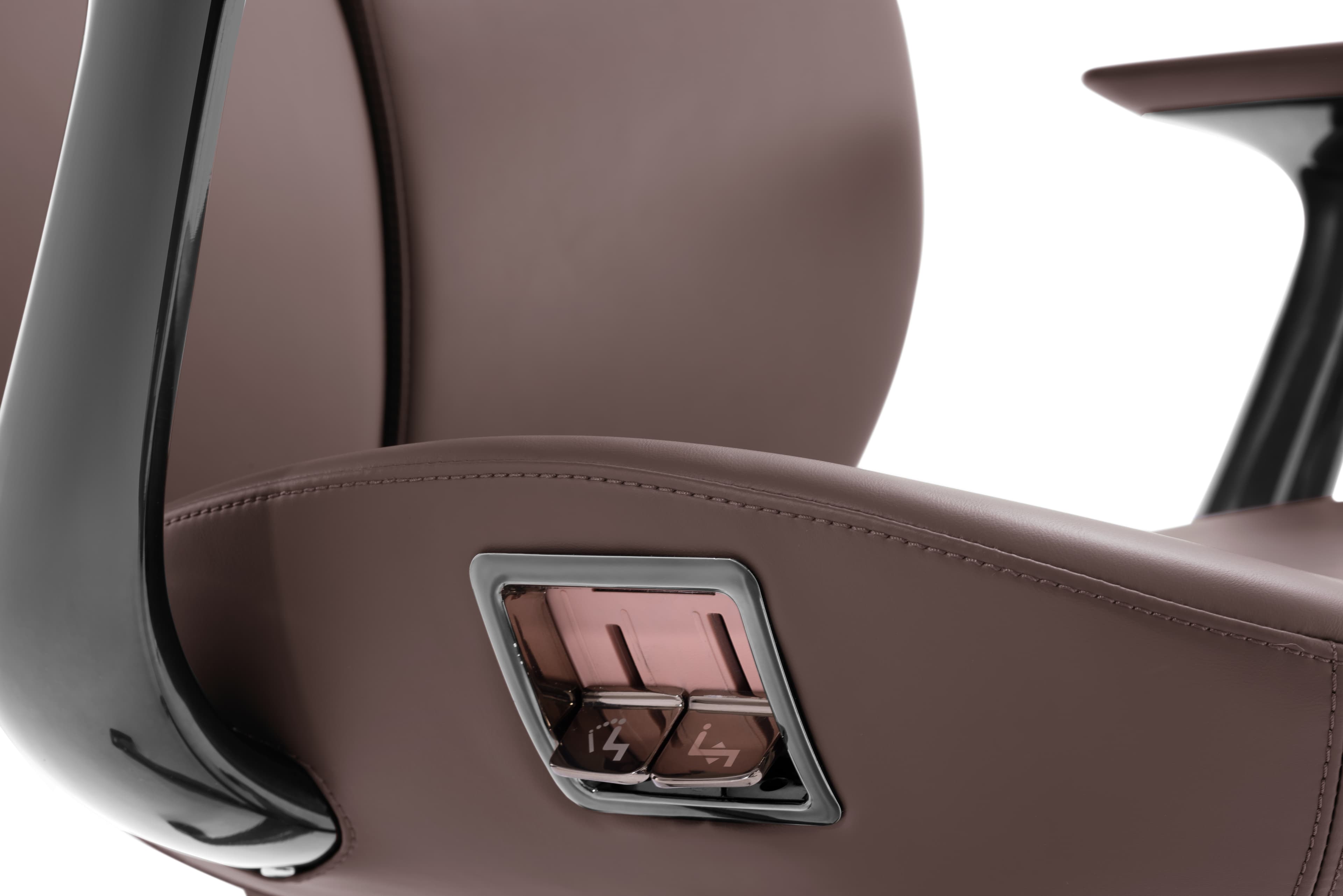 Close detail of upholstery, aluminum armrest and chair frame